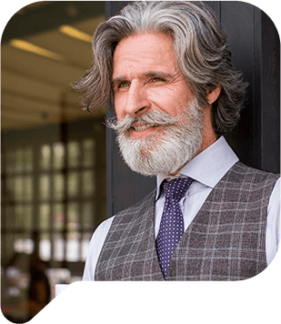Bearded male enjoying coffee